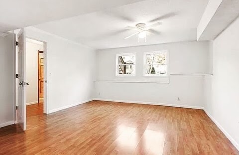 Basement Before - Dark stained blue carpet