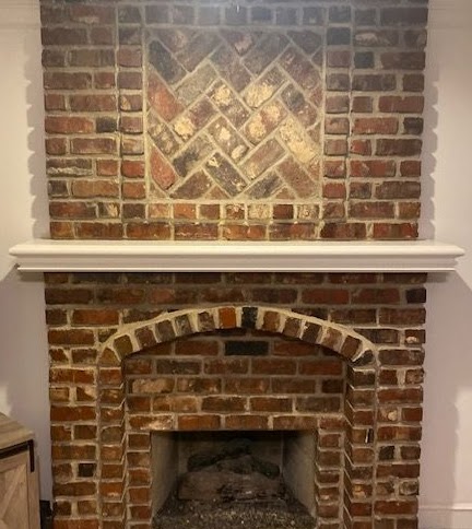 Fireplace Before - Dated dark brick