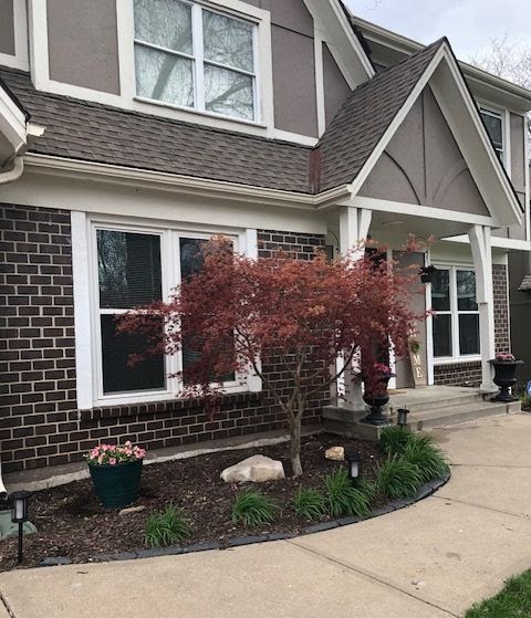 House Before - Outdated yellow siding